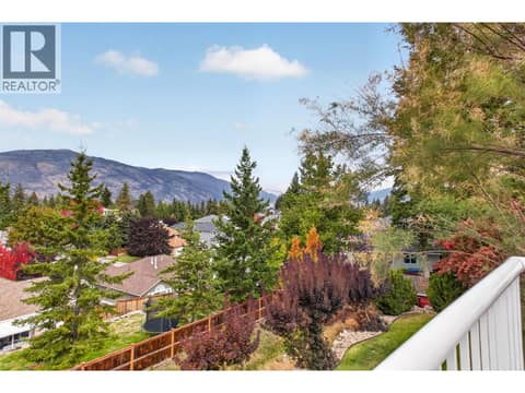 Beautiful valley and mountain views provide a peaceful backdrop from the home and outdoor living spaces. at 330 Woodwind Court, Glenmore, Kelowna