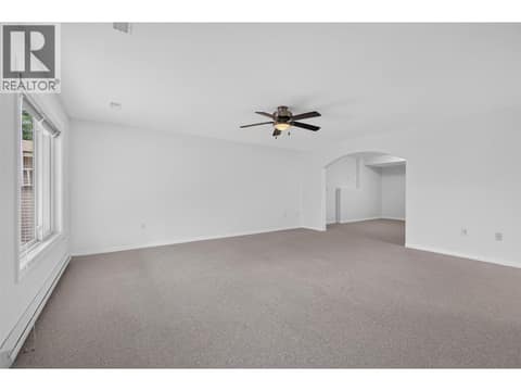 Spacious downstairs rec room offering plenty of space for the kids, movie nights, games, or a second family living area. at 330 Woodwind Court, Glenmore, Kelowna