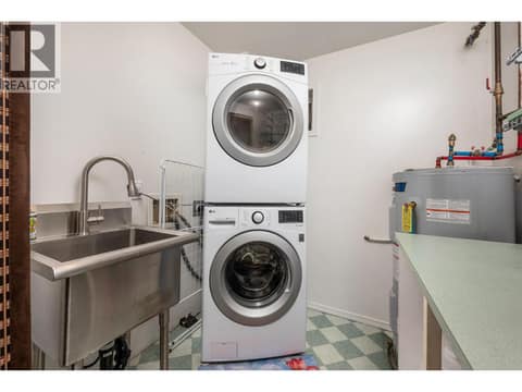 Laundry in lower level of main home at 4405 Ottley Road, Lake Country South West