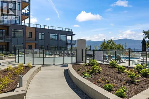 Outdoor Community Space with access to the Outdoor Pool and Hot Tub at 2780 Olalla Road Unit# 203, Lakeview Heights, West Kelowna