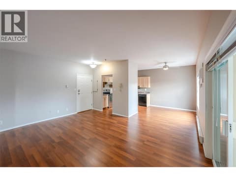 Open concept living room to dining room at 650 MCKINNEY Road Unit# 325, Oliver