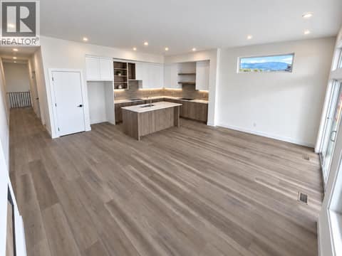 Living Room and Kitchen (still under construction) at 3746 Morningside Drive, Glenrosa, West Kelowna