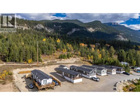 Drone shot of neighbouring properties at 470 Reflection Lake Road Unit# 46, South Hwy 95, Golden