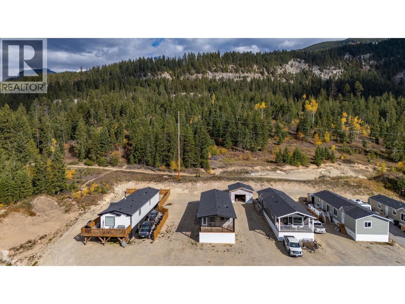 Drone shot of neighbouring properties at 470 Reflection Lake Road Unit# 46, South Hwy 95, Golden