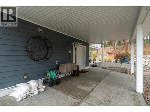 Covered back patio at 6976 Terazona Drive, Fintry, Kelowna