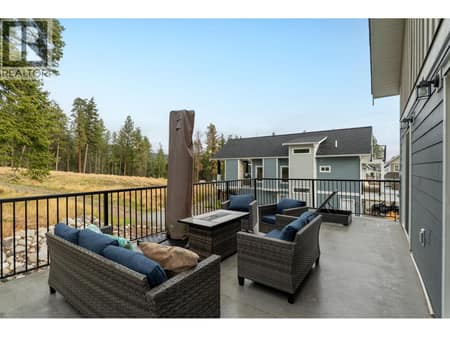 Patio off main floor bedrooms at 6976 Terazona Drive, Fintry, Kelowna