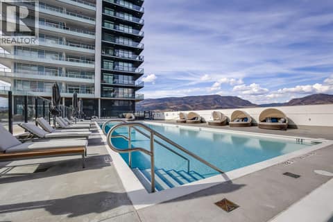 Large outdoor pool with two year round hot tubs at 1626 Water Street Unit# 1804, Kelowna North