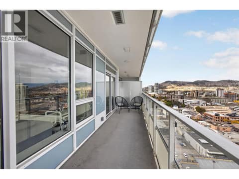 Patio wraps around to the primary bedroom at 1626 Water Street Unit# 1804, Kelowna North