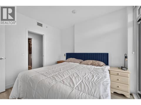 Primary bedroom with walk through closet & full ensuite at 1626 Water Street Unit# 1804, Kelowna North