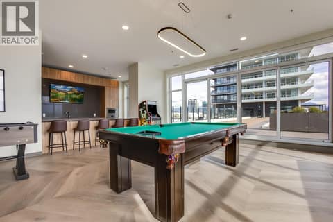 With a full kitchen, TV & seating at 1626 Water Street Unit# 1804, Kelowna North