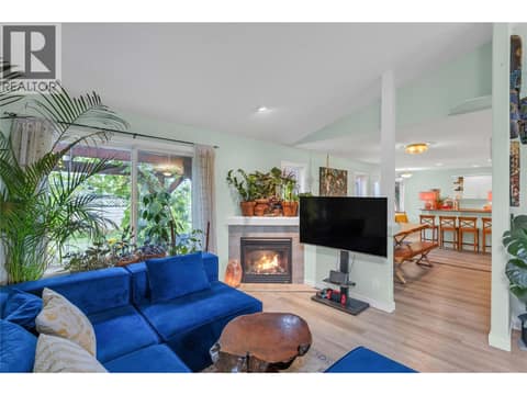 Cozy up to the gas fireplace at 705 Stoltz Court, Rutland North, Kelowna