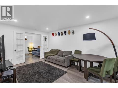 Legal suite dining/living room at 705 Stoltz Court, Rutland North, Kelowna