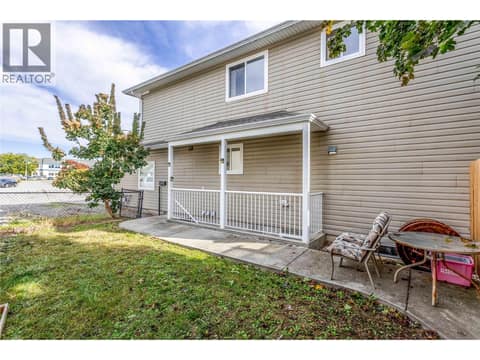 Legal suite has its own private fenced yard at 705 Stoltz Court, Rutland North, Kelowna