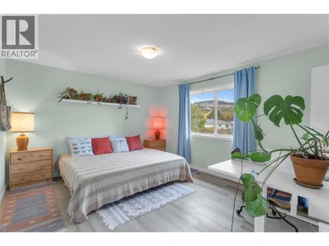 Primary bedroom on the upper floor at 705 Stoltz Court, Rutland North, Kelowna