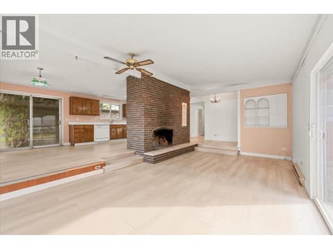 Large brick fireplace at 4583 Bonjou Road, Lower Mission, Kelowna