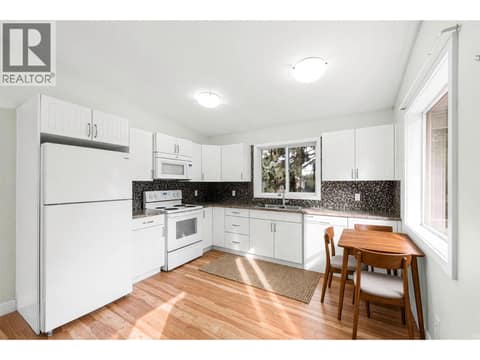 Virtually staged kitchen at 4583 Bonjou Road, Lower Mission, Kelowna