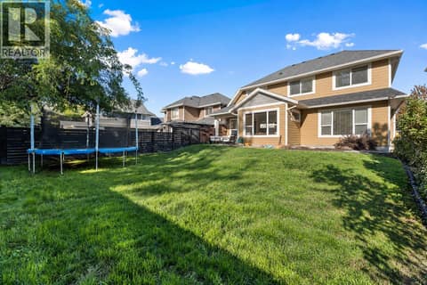Pool sized, private yard at 515 Wren Place Unit# 133, Upper Mission, Kelowna