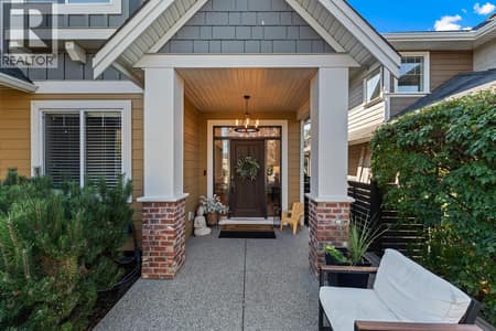 Welcoming covered entry and mature landscaping at 515 Wren Place Unit# 133, Upper Mission, Kelowna