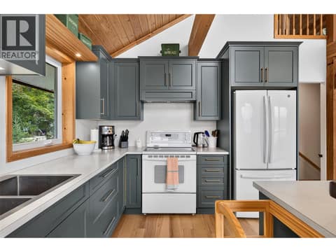 Recently renovated kitchen features stylish cabinetry, updated countertops, and a new fridge. at 359 Kildare Way, Okanagan North, Vernon