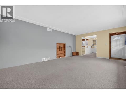 Living room at 879 Trench Court, Kelowna North