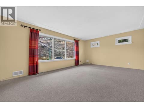 Living room at 879 Trench Court, Kelowna North