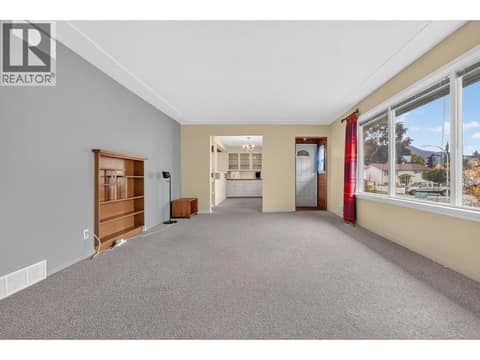 Living room at 879 Trench Court, Kelowna North