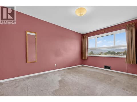 Primary bedroom at 879 Trench Court, Kelowna North