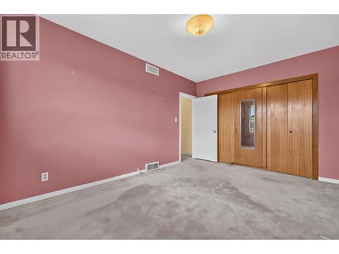 Primary bedroom at 879 Trench Court, Kelowna North