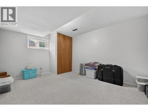 Suite bedroom at 879 Trench Court, Kelowna North