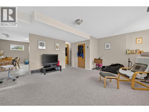 Suite living room at 879 Trench Court, Kelowna North