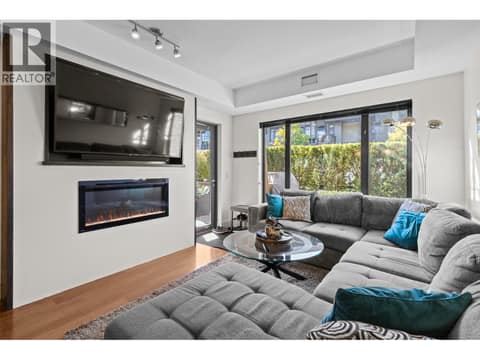 Custom large TV alcove with large electric fireplace insert at 580 Sarsons Road Unit# 115, Lower Mission, Kelowna