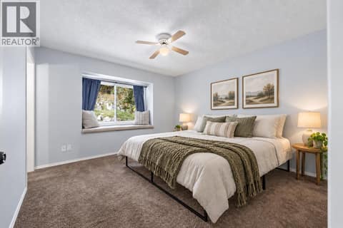 5 bed + den/ 3 bath home - 3 bed/2 bath on the main level & 2 bed + den/ 1 bath on the lower level ** PARTIAL VIRTUAL STAGING & AI GENERATED ** at 3220 McIver Road, Glenrosa, West Kelowna