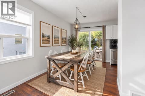 Dining Room | Main Level ** PARTIAL VIRTUAL STAGING & AI GENERATED ** at 3220 McIver Road, Glenrosa, West Kelowna