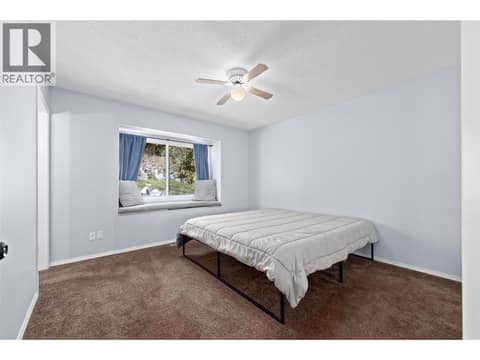 Primary Bedroom | Main Level -(Bedroom #1) with 4 piece ensuite at 3220 McIver Road, Glenrosa, West Kelowna