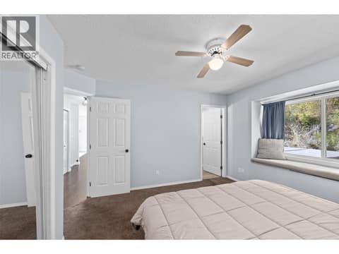 Primary Bedroom | Main Level -(Bedroom #1) with 4 piece ensuite at 3220 McIver Road, Glenrosa, West Kelowna