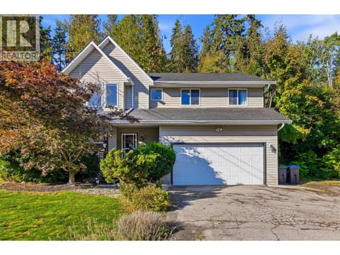Updated 5 Bed + Den/ 3 Bath home with an attached double-car garage + additional driveway parking on a .42 acre lot. at 3220 McIver Road, Glenrosa, West Kelowna
