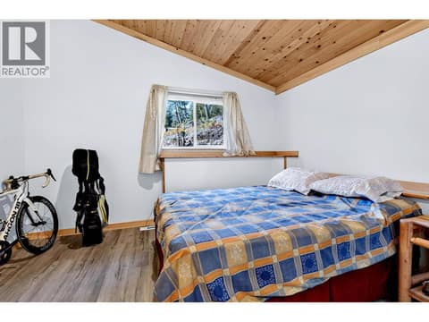 First bedroom on main floor at 9524 Tranquille Criss Creek Road, Red Lake, Kamloops