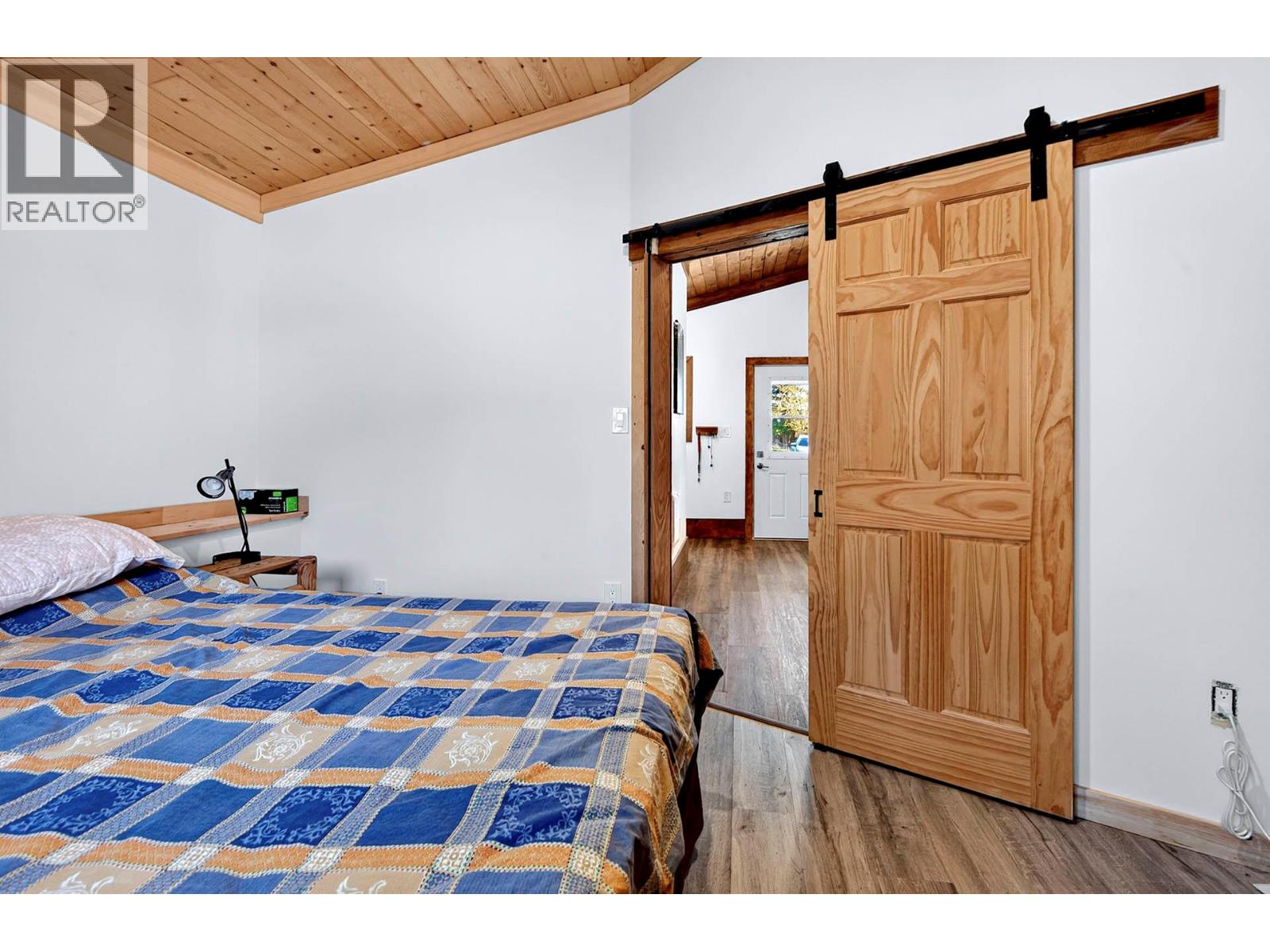First bedroom on main floor at 9524 Tranquille Criss Creek Road, Red Lake, Kamloops