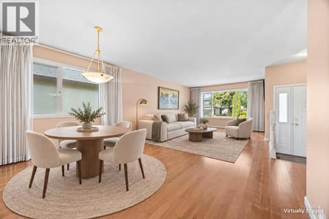 Dining and living room with virtually staged furnishings at 884 Mission Springs Crescent, Lower Mission, Kelowna