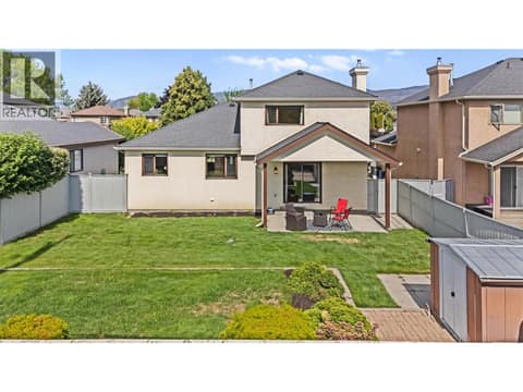 Fenced backyard at 884 Mission Springs Crescent, Lower Mission, Kelowna