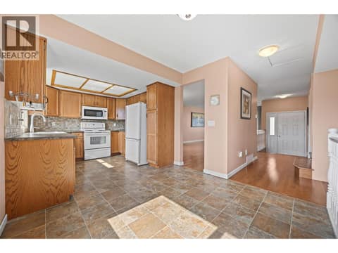 Kitchen & breakfast area at 884 Mission Springs Crescent, Lower Mission, Kelowna