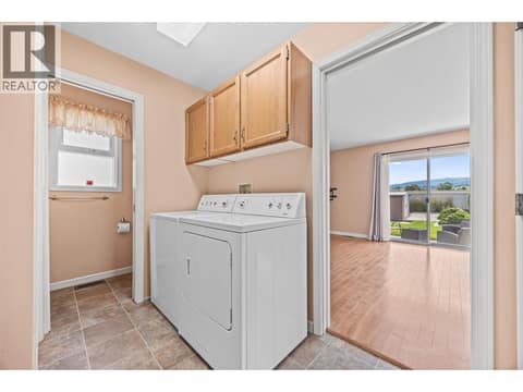 Main floor laundry room at 884 Mission Springs Crescent, Lower Mission, Kelowna