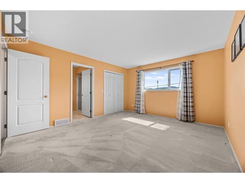 Primary bedroom at 884 Mission Springs Crescent, Lower Mission, Kelowna