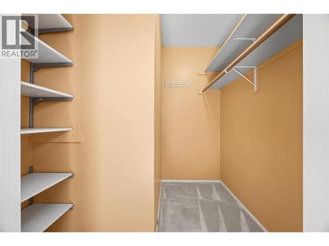 Primary walk-in closet at 884 Mission Springs Crescent, Lower Mission, Kelowna