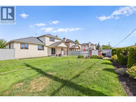 Spacious fenced backyard at 884 Mission Springs Crescent, Lower Mission, Kelowna