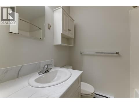 4 piece main bathroom at 246 Briarwood Road, Rutland North, Kelowna