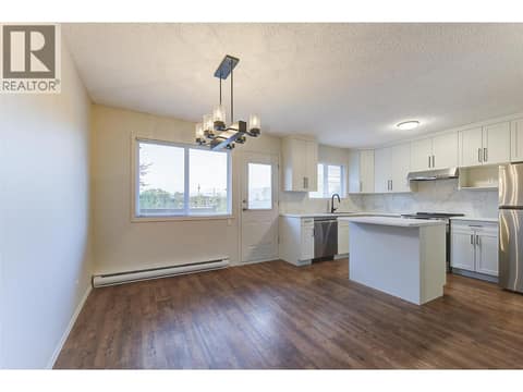 Dining-Kitchen area with entertaining friendly open plan at 246 Briarwood Road, Rutland North, Kelowna