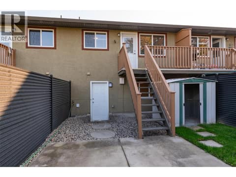 Easy access to back yard from up and down at 246 Briarwood Road, Rutland North, Kelowna