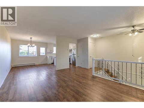Large living-dining room at 246 Briarwood Road, Rutland North, Kelowna
