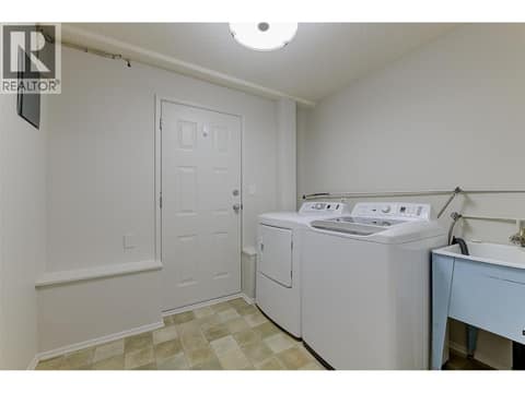 Separate Laundry and mudroom at 246 Briarwood Road, Rutland North, Kelowna
